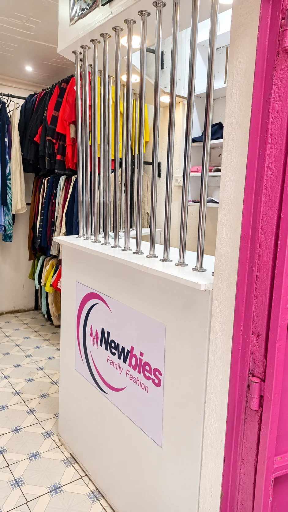 The Newbies Family Fashion counter and pink entrance door